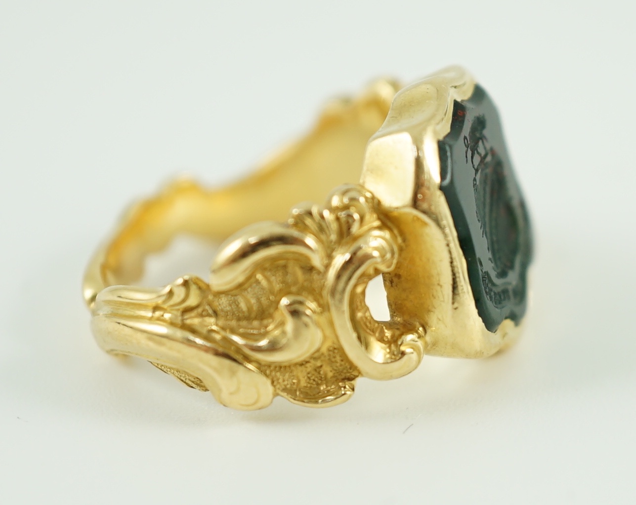 A 19th century gold and bloodstone set intaglio ring